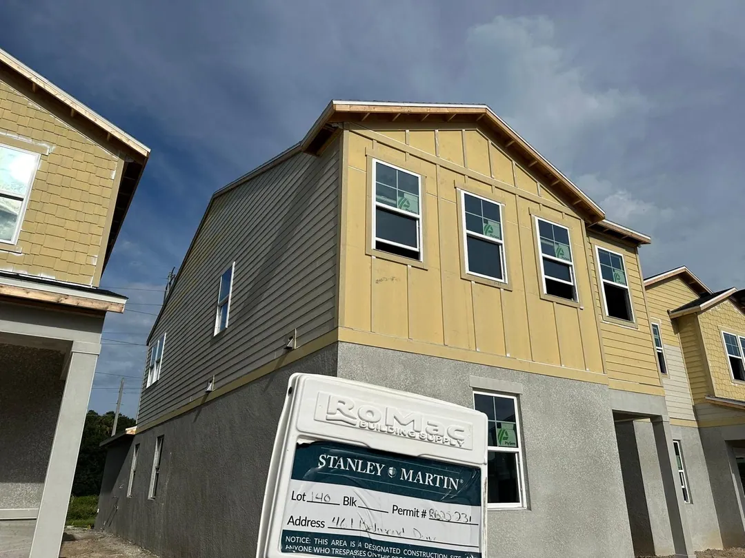 Residential production home siding installed during construction