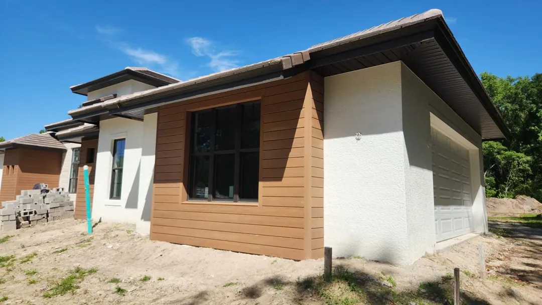 Brown siding on modern custom home